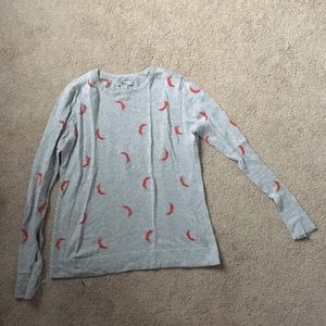 Gray sweater with chili peppers